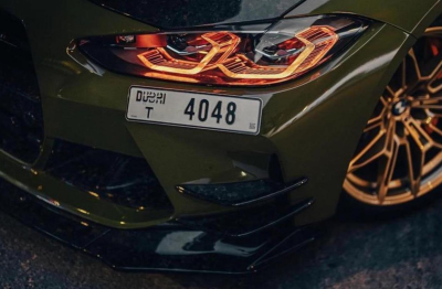 Green BMW M3 Competition 2025