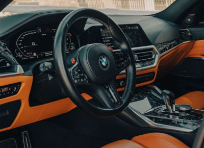 Green BMW M3 Competition 2025