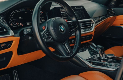 Green BMW M3 Competition 2025